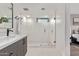 Stylish bathroom with a glass shower, modern vanity, and contemporary fixtures at 7962 E San Miguel Ave, Scottsdale, AZ 85250
