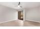 Bedroom boasts hardwood floors and a sliding glass door at 7962 E San Miguel Ave, Scottsdale, AZ 85250