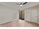 Bedroom boasts hardwood floors and a sliding glass door at 7962 E San Miguel Ave, Scottsdale, AZ 85250