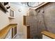 Custom bathroom featuring a walk-in shower, built-in shelves, and charming details at 8042 N 28Th Ave, Phoenix, AZ 85051