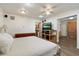 Primary bedroom offering ample space, a ceiling fan, and wood-look floors at 8042 N 28Th Ave, Phoenix, AZ 85051