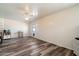 Inviting living room with wood-look floors, neutral walls, and lots of light at 8042 N 28Th Ave, Phoenix, AZ 85051