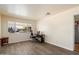 Bright office space with vinyl floors, a window overlooking the front yard, and neutral decor at 8042 N 28Th Ave, Phoenix, AZ 85051