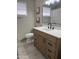 Bathroom featuring modern vanity, new fixtures, and a tiled floor at 845 N Los Alamos Dr, Goodyear, AZ 85338