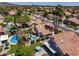 Lush backyard oasis with a sparkling pool and mature landscaping. Multiple pools throughout the neighborhood at 9012 E Sutton Dr, Scottsdale, AZ 85260