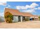 Charming single-story home with a carport, neutral paint, and low-maintenance landscaping at 9028 W Osborn Rd, Phoenix, AZ 85037