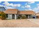 Charming single-story home with a carport, neutral paint, and low-maintenance landscaping at 9028 W Osborn Rd, Phoenix, AZ 85037