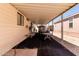 Relaxing covered patio area for outdoor living and socializing; shade and comfort combined at 9333 E University Dr # 83, Mesa, AZ 85207
