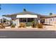 Charming single-story home with covered parking, manicured landscaping, and a cozy, welcoming facade at 9333 E University Dr # 83, Mesa, AZ 85207