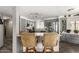 Modern kitchen with a breakfast bar, stainless steel appliances, and stylish finishes, great for entertaining at 9333 E University Dr # 83, Mesa, AZ 85207