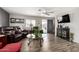 Comfortable living room with cozy seating, sleek entertainment center, and seamless indoor-outdoor flow at 9333 E University Dr # 83, Mesa, AZ 85207