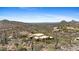 Desert home with sweeping scenic views and beautifully landscaped surroundings at 11334 E Troon Vista Dr, Scottsdale, AZ 85255
