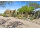 Desert home with landscaped front yard and mature cacti at 11334 E Troon Vista Dr, Scottsdale, AZ 85255