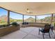 Spacious covered patio featuring comfortable seating and mountain views at 11334 E Troon Vista Dr, Scottsdale, AZ 85255