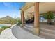 Covered patio with ceiling fans and comfortable seating at 11334 E Troon Vista Dr, Scottsdale, AZ 85255