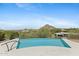 Infinity pool with stunning desert and mountain views at 11334 E Troon Vista Dr, Scottsdale, AZ 85255