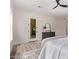 Bright, airy bedroom with modern finishes and access to an outdoor patio at 12906 W Oyer Ln, Peoria, AZ 85383