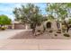 Front exterior view of home with desert landscaping and driveway at 12906 W Oyer Ln, Peoria, AZ 85383