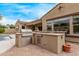 Built-in BBQ and outdoor kitchen area on the patio at 12906 W Oyer Ln, Peoria, AZ 85383