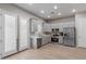 Well-lit kitchen boasts gray cabinetry, stainless steel appliances, and wood-look tile flooring at 1367 S Country Club Dr # 1039, Mesa, AZ 85210
