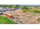 Property aerial displays generous land, mature tree, and possible development opportunities in a tranquil setting at 14415 N 184Th Ave, Surprise, AZ 85388