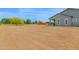 Expansive backyard featuring patio area and ample space for outdoor activities at 14415 N 184Th Ave, Surprise, AZ 85388