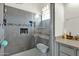 Shower with tiled walls and floors offers a spa-like experience in this well-appointed bathroom at 14415 N 184Th Ave, Surprise, AZ 85388