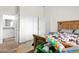 Comfortable bedroom featuring a nice bed and a view to the bathroom at 14415 N 184Th Ave, Surprise, AZ 85388