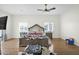 Spacious main bedroom with hardwood floors, ceiling fan, and natural light at 14415 N 184Th Ave, Surprise, AZ 85388