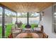 Inviting covered patio with fireplace, outdoor dining and seating area at 1702 W Glenrosa Ave, Phoenix, AZ 85015