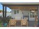 Outdoor living space with comfortable furniture under a covered patio with grill at 1702 W Glenrosa Ave, Phoenix, AZ 85015