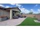 Beautiful backyard with a covered patio, perfect for entertaining and outdoor enjoyment at 17211 W Whispering Wind Rd, Surprise, AZ 85387