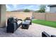 Cozy backyard patio with outdoor seating, perfect for relaxing and enjoying the outdoors at 17211 W Whispering Wind Rd, Surprise, AZ 85387