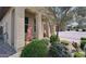 Attractive landscaping with mature trees and a decorative fountain creates a serene outdoor setting at 17211 W Whispering Wind Rd, Surprise, AZ 85387