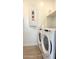 Laundry room featuring a side-by-side washer and dryer and ample storage space at 17211 W Whispering Wind Rd, Surprise, AZ 85387