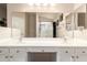 Bright bathroom featuring a double vanity and walk-in shower at 1737 E Primera Dr, Casa Grande, AZ 85122