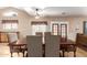 Dining room with wood table with seating for six and natural lighting at 1737 E Primera Dr, Casa Grande, AZ 85122