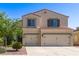 Charming two-story home featuring a two-car garage and low maintenance landscaping at 1737 E Primera Dr, Casa Grande, AZ 85122