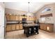 Well-appointed kitchen with granite countertops, large island, and stainless steel appliances at 1737 E Primera Dr, Casa Grande, AZ 85122