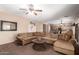 Cozy living room featuring neutral color palette and comfortable sectional sofa at 1737 E Primera Dr, Casa Grande, AZ 85122
