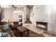 Inviting living room with high ceilings, tile floors, and easy access to stairway at 1737 E Primera Dr, Casa Grande, AZ 85122