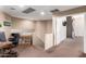 The loft area features neutral paint, soft carpet, and access to a bedroom at 1737 E Primera Dr, Casa Grande, AZ 85122