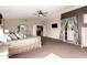Main bedroom featuring neutral carpet and an ensuite entrance at 1737 E Primera Dr, Casa Grande, AZ 85122
