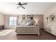 Main bedroom featuring a large window, neutral carpeting and decor at 1737 E Primera Dr, Casa Grande, AZ 85122