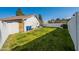 Spacious backyard featuring a well-maintained lawn and a basketball hoop at 1747 W Echo Ln, Phoenix, AZ 85021
