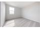 This bedroom features neutral carpet, ample natural light and a simple, clean aesthetic at 17977 W Camino De Oro Riv, Surprise, AZ 85387