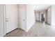 Foyer showcases tile flooring and neutral paint at 17977 W Camino De Oro Riv, Surprise, AZ 85387