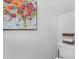 A powder room features a decorative floral painting at 18811 N 34Th Ave # 6, Phoenix, AZ 85027