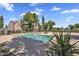 Community pool surrounded by well-maintained landscaping and neighborhood townhomes at 18811 N 34Th Ave # 6, Phoenix, AZ 85027