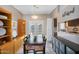 Dining room area features a dark wood table and built-in shelving at 18811 N 34Th Ave # 6, Phoenix, AZ 85027